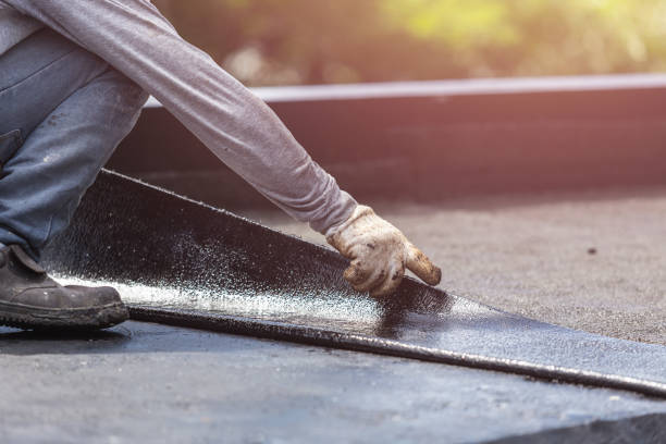 Professional Basement Waterproofing technician working in Stroh, IN